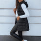 Lang gewatteerd vest met rits voor dames